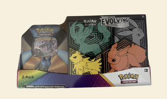 compare product Pokemon: Evolving Skies Elite Trainer Box and Tin Bundle